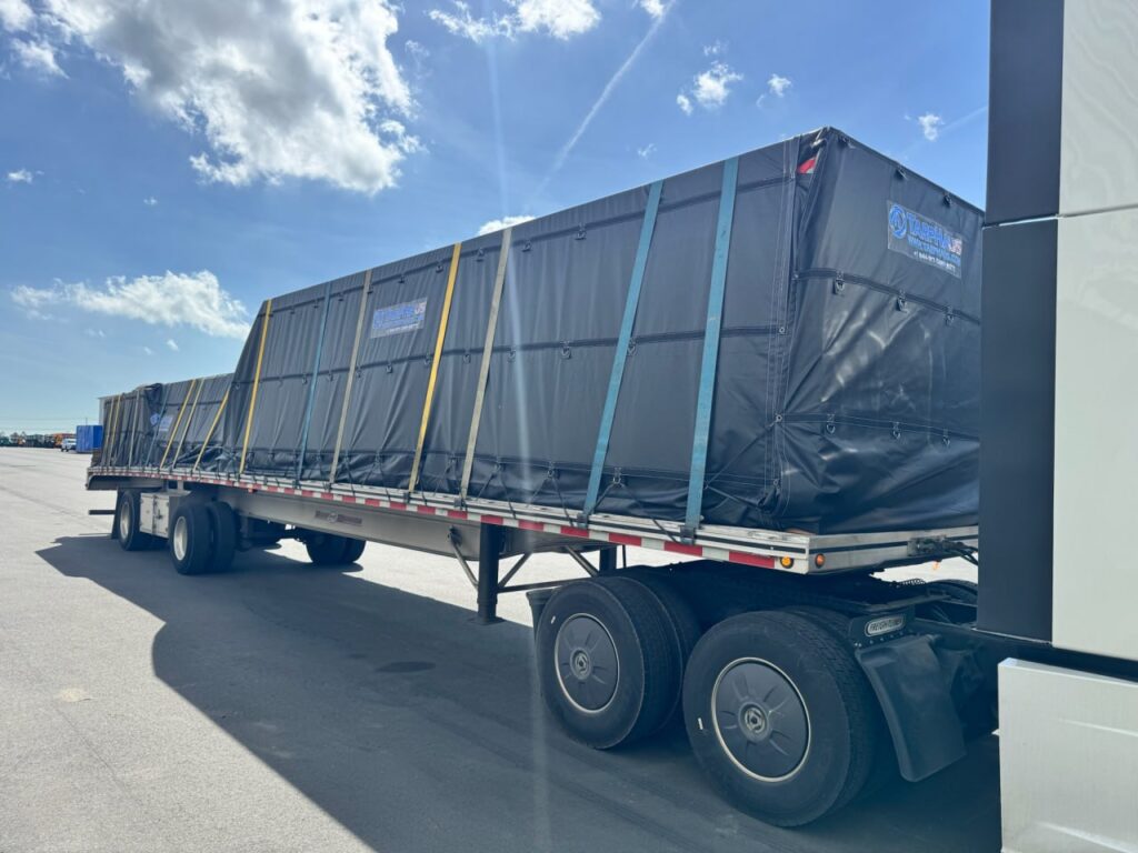 Semi truck trailer with secured load.
