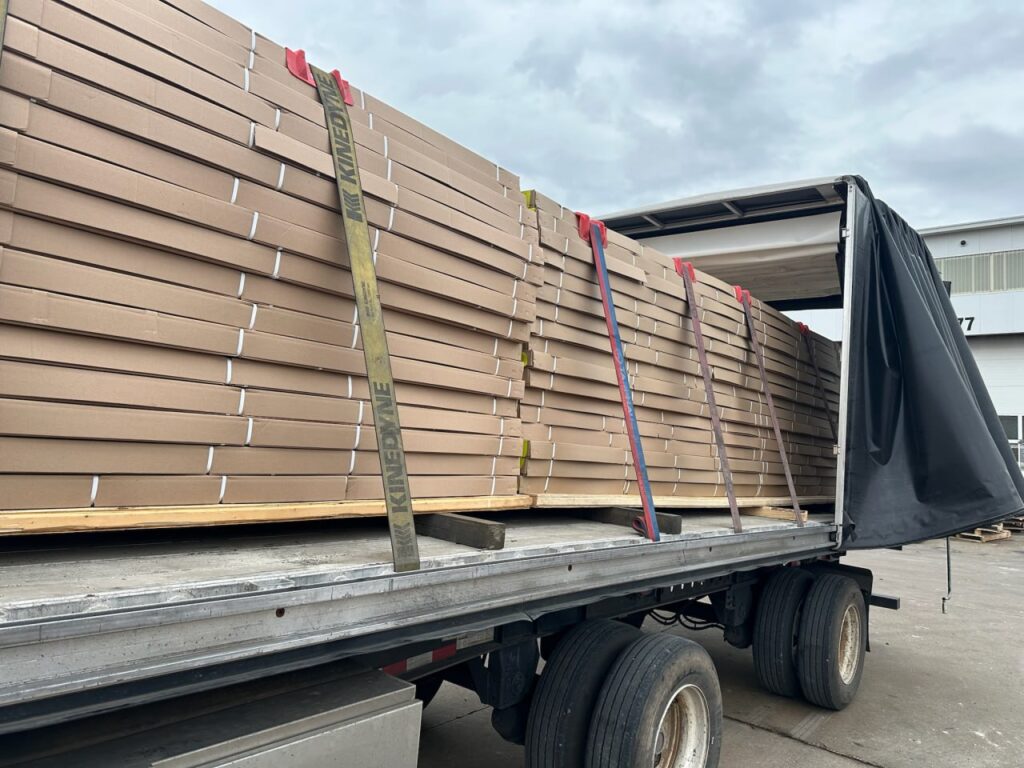 Semi truck trailer with secured load.